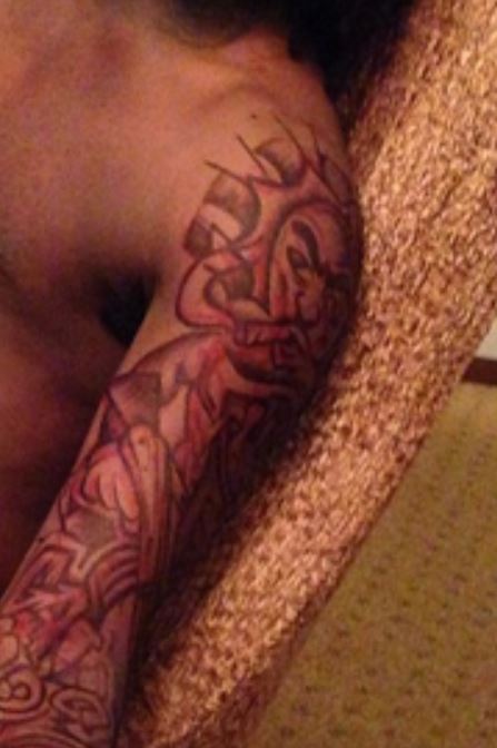 Chief left arm tattoo