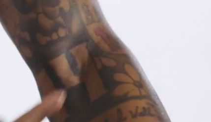 Jarvis 14 and NFL tattoo