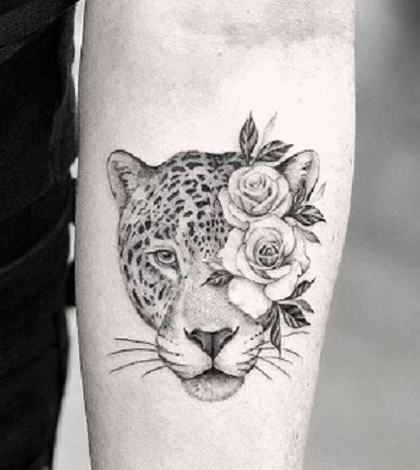 white leopard blue eyes tattoo