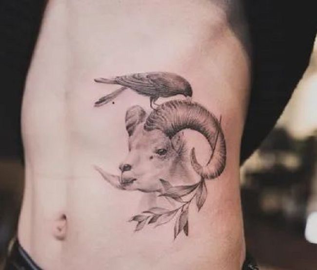 'Crow sitting over a Goat Horn' Tattoo
