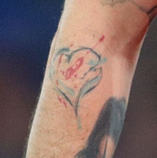Damien heart tattoo