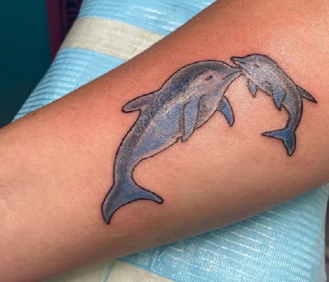 'Father with Baby Dolphin' Tattoo