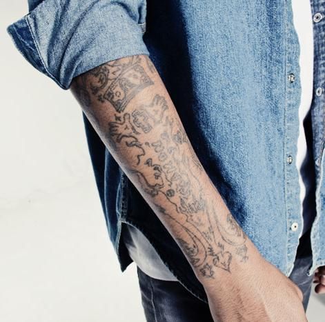 Kid Cudi right arm tattoo