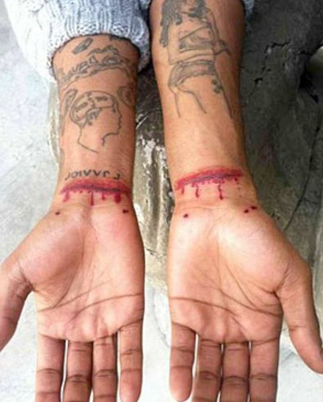 Kid Cudi wrist tattoos