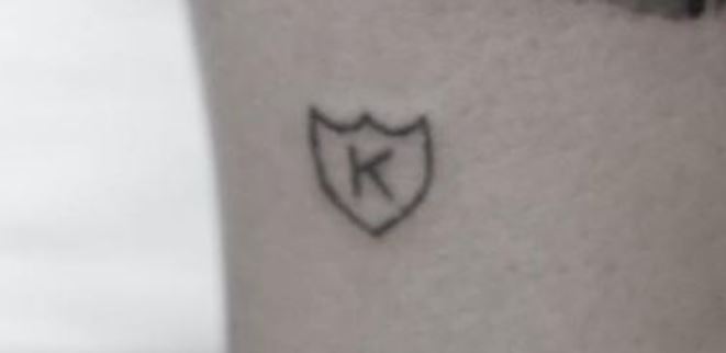 Kid logo tattoo