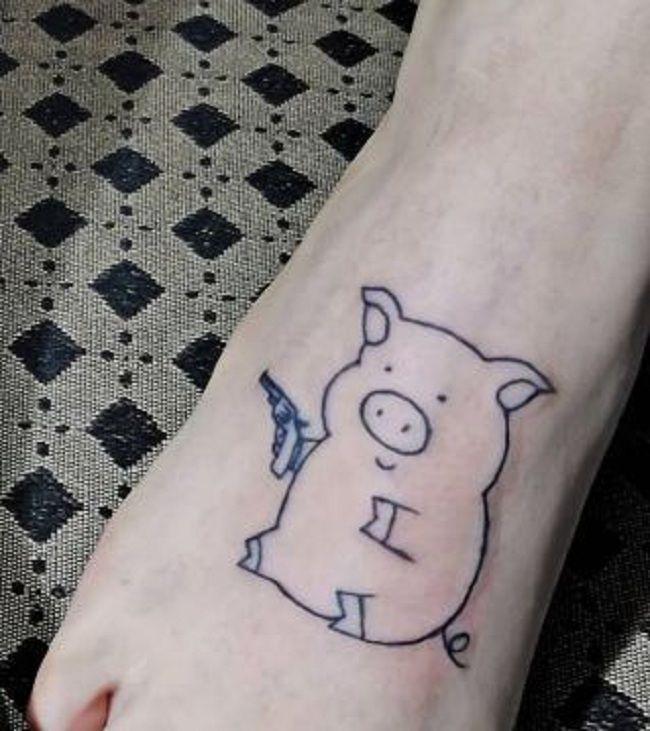 'Pig holding a Gun' Tattoo