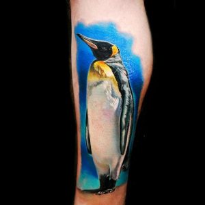 45+ Penguin Tattoos with Meanings - Body Art Guru
