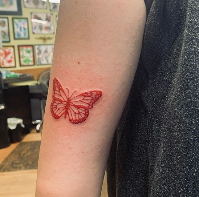 Red Outlined Butterfly Tattoo
