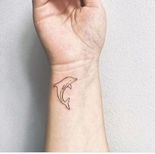 Tiny Dolphin Tattoo