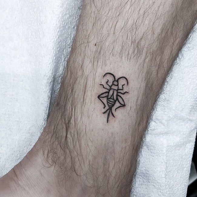 Tiny Grasshopper Tattoo