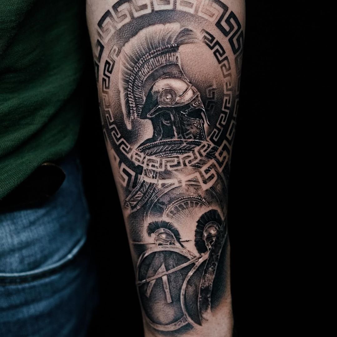 2 Spartan helmet tattoo meaning