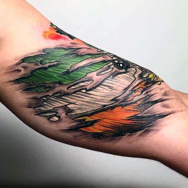 6 green orange and white irish flag mens torn skin arm tattoo