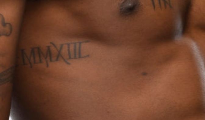 Kevin roman numerals tattoo