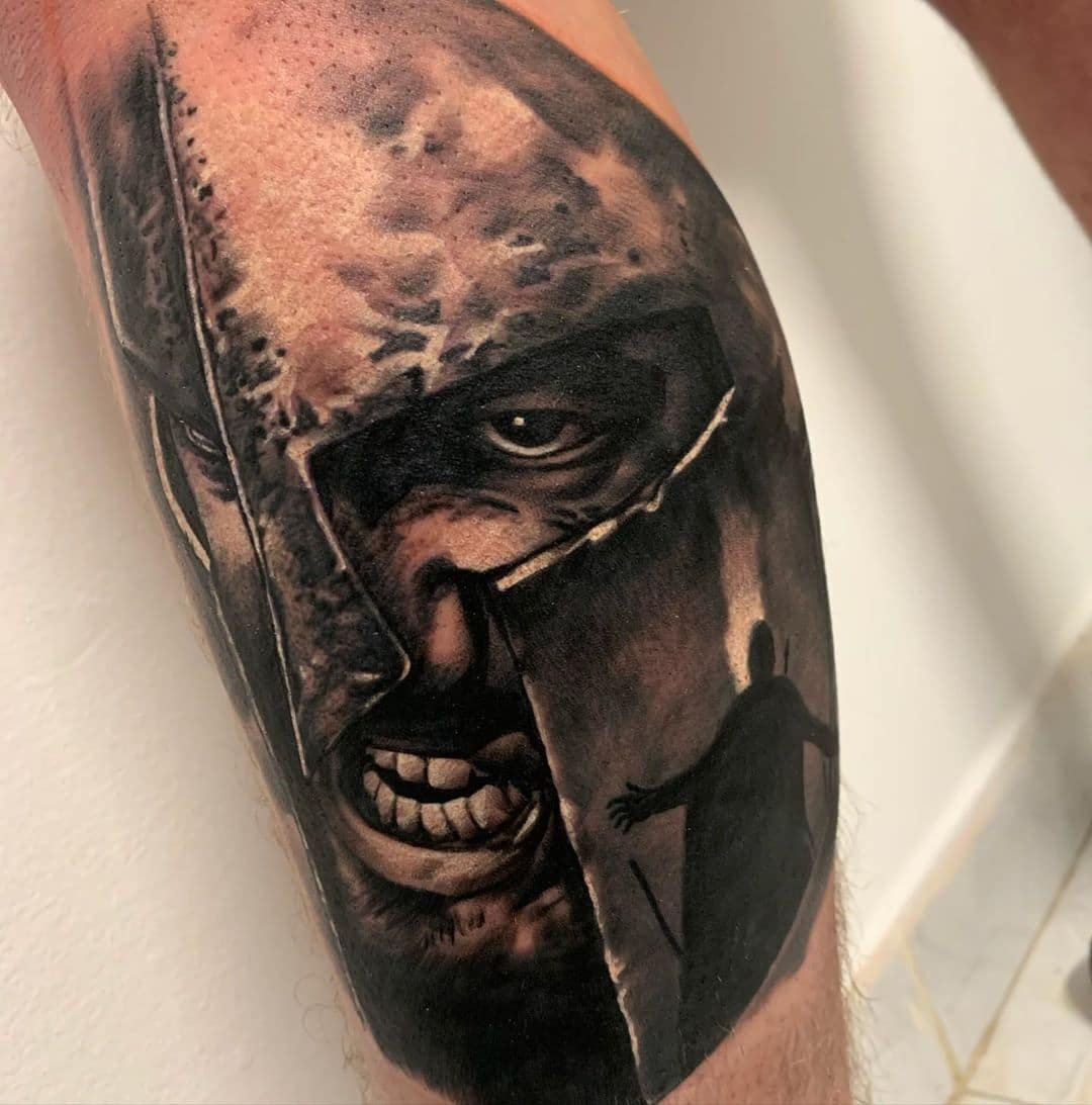 Spartan tattoo, looking for similar design but central to the upper back,  no bigger than A4. Preferably a forward facing Spartan design if anyone can  help and make it look in place