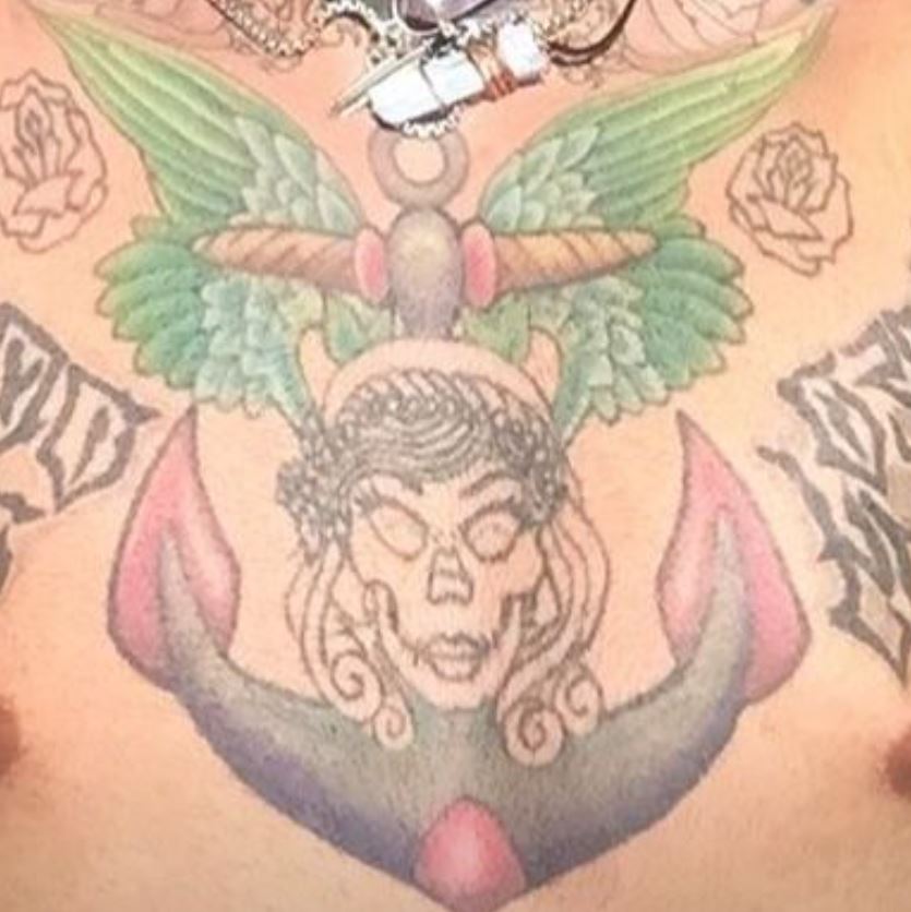 Johnny chest tattoo