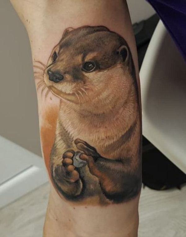 'Otter holding a Stone' Tattoo