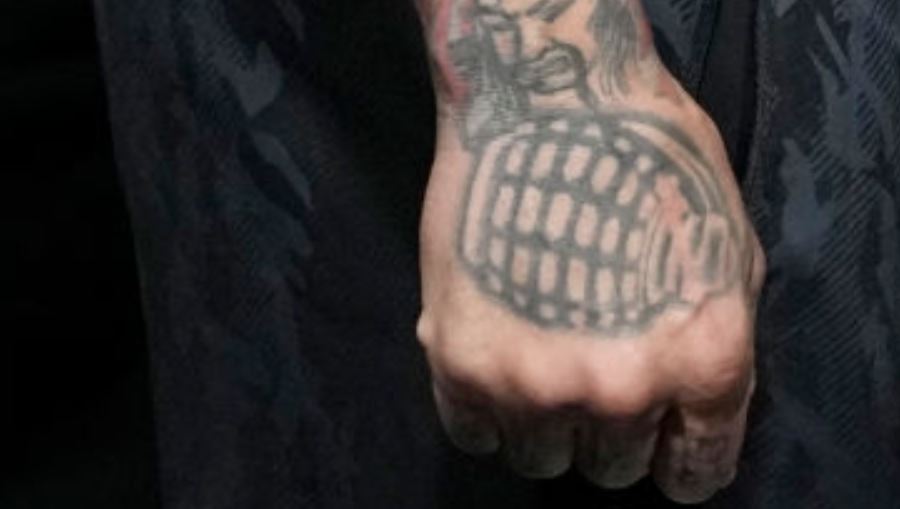 Anthony grenade tattoo