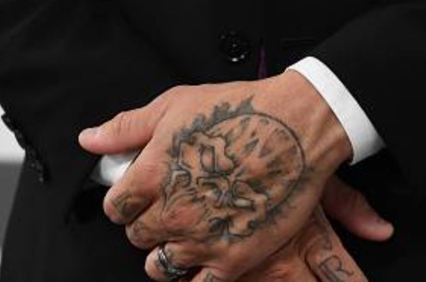 Anthony left hand tattoo