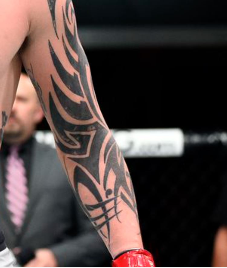 Anthony tribal arm tattoo