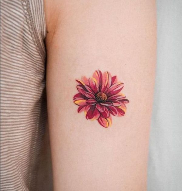 Cute Dahlia Tattoo Design On Upper Arm