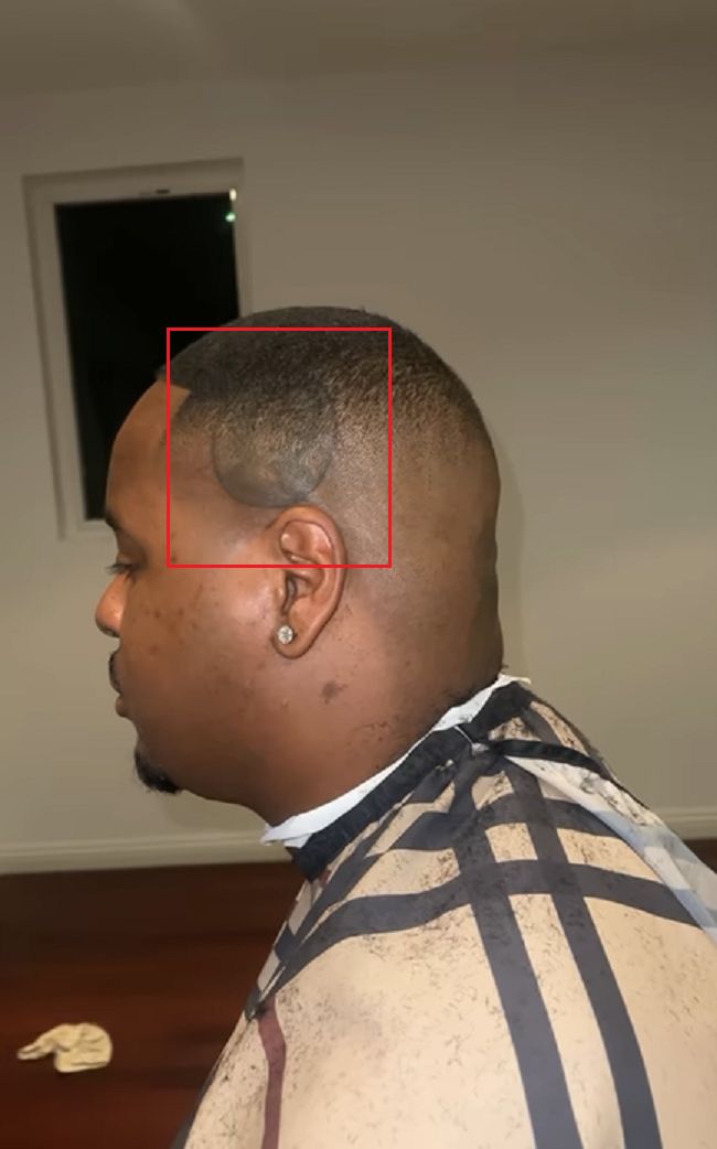 Tattoo left side of head-Drakeo Ruler