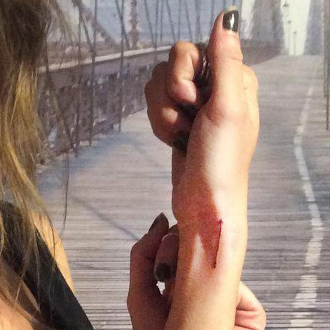 eleanor calder arrow wrist tattoo