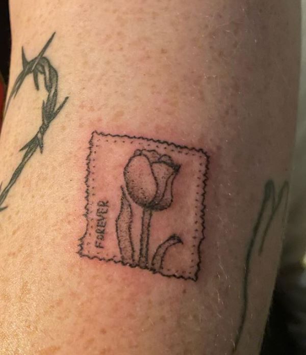 Tulip Stamp Tattoo Design on Forehand