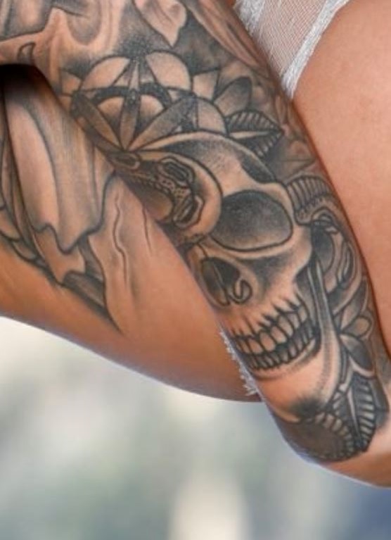 karma RX skull and flowers tattoo