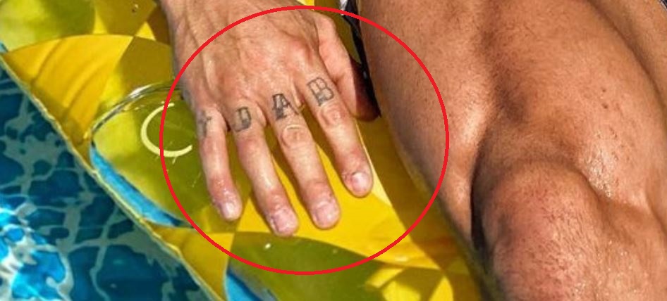 Ross finger tattoo