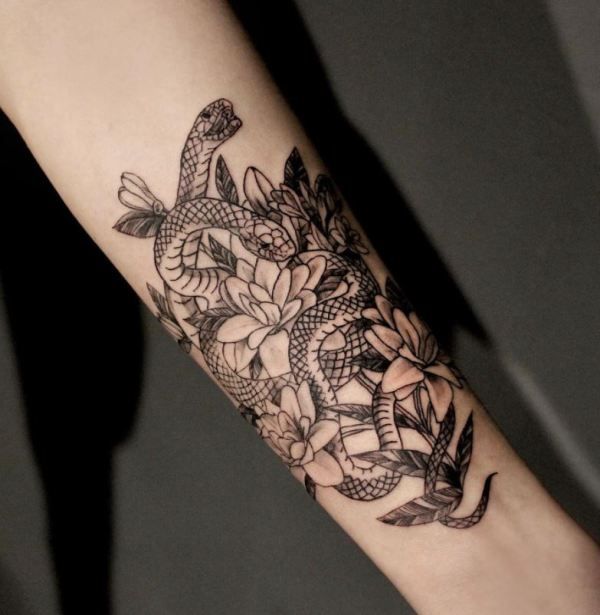 Tuberose with Snake Tattoo Design on Forearm