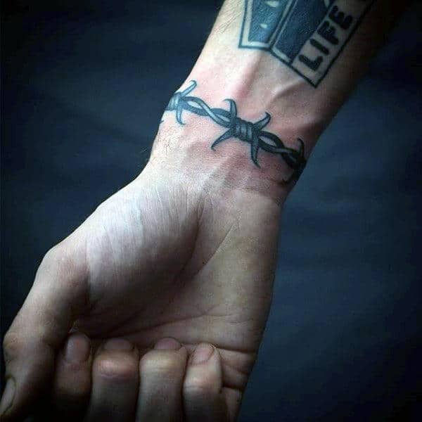 The True Meaning Behind Barbed Wire Tattoos Body Art Guru