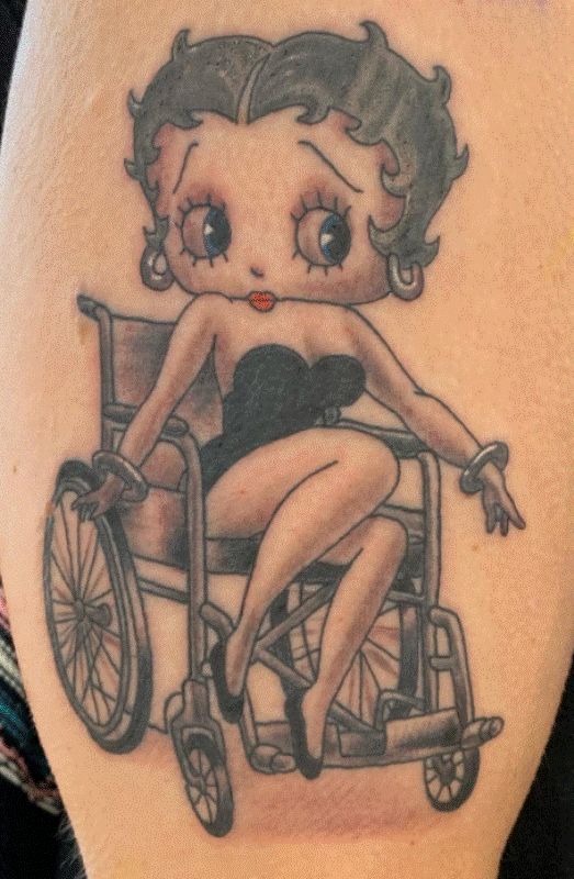 Betty Boop on Wheelchair Tattoo Design on Shoulder