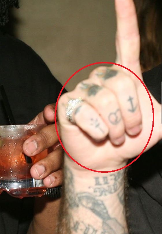 Robert finger tattoos