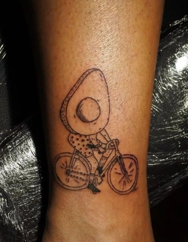 Avocado on a Cycle Tattoo Design on the Forearm