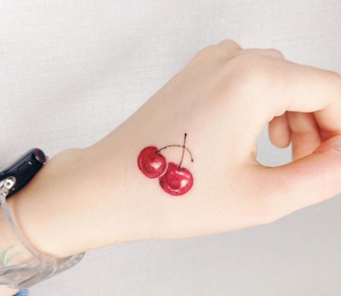Sweet Cherry Tattoo Design on the Hand