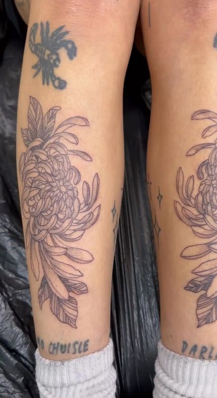 Floral tattoo on legs